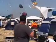 Dust Devil Makes Tourists' Stuff Fly Around