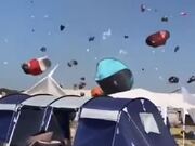 Dust Devil Makes Tourists' Stuff Fly Around