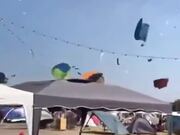 Dust Devil Makes Tourists' Stuff Fly Around
