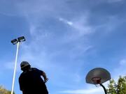 Guy Performs Basketball Trickshots