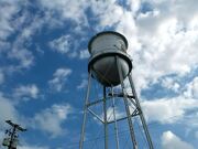 Water Tower with Time-Lapse Clouds