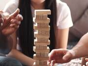 Friends Playing Jenga