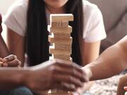 Friends Playing Jenga