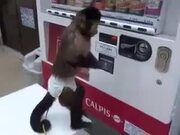 Monkey Buys Drink Using A Vending Machine