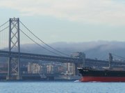 Cargo Ship Passing Under