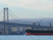 Cargo Ship Passing Under