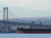 Cargo Ship Passing Under