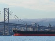 Cargo Ship Passing Under
